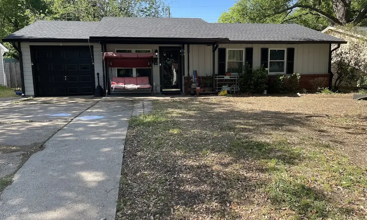 Wind Damage Roof Repair crew at work on a residential roof in Aiken